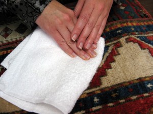 Blotting a rug stain after rinsing