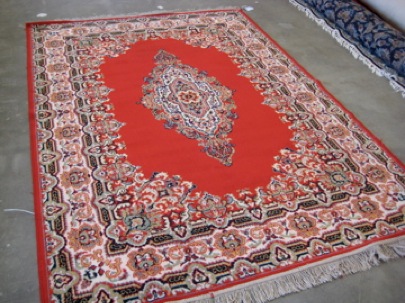 Picture of beautiful red rug after cleaning